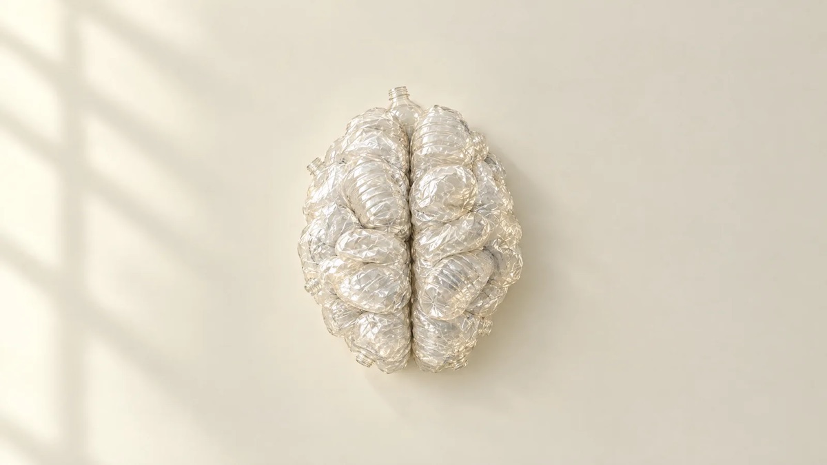 Illustration: a brain made of crushed plastic water bottles, seen from above